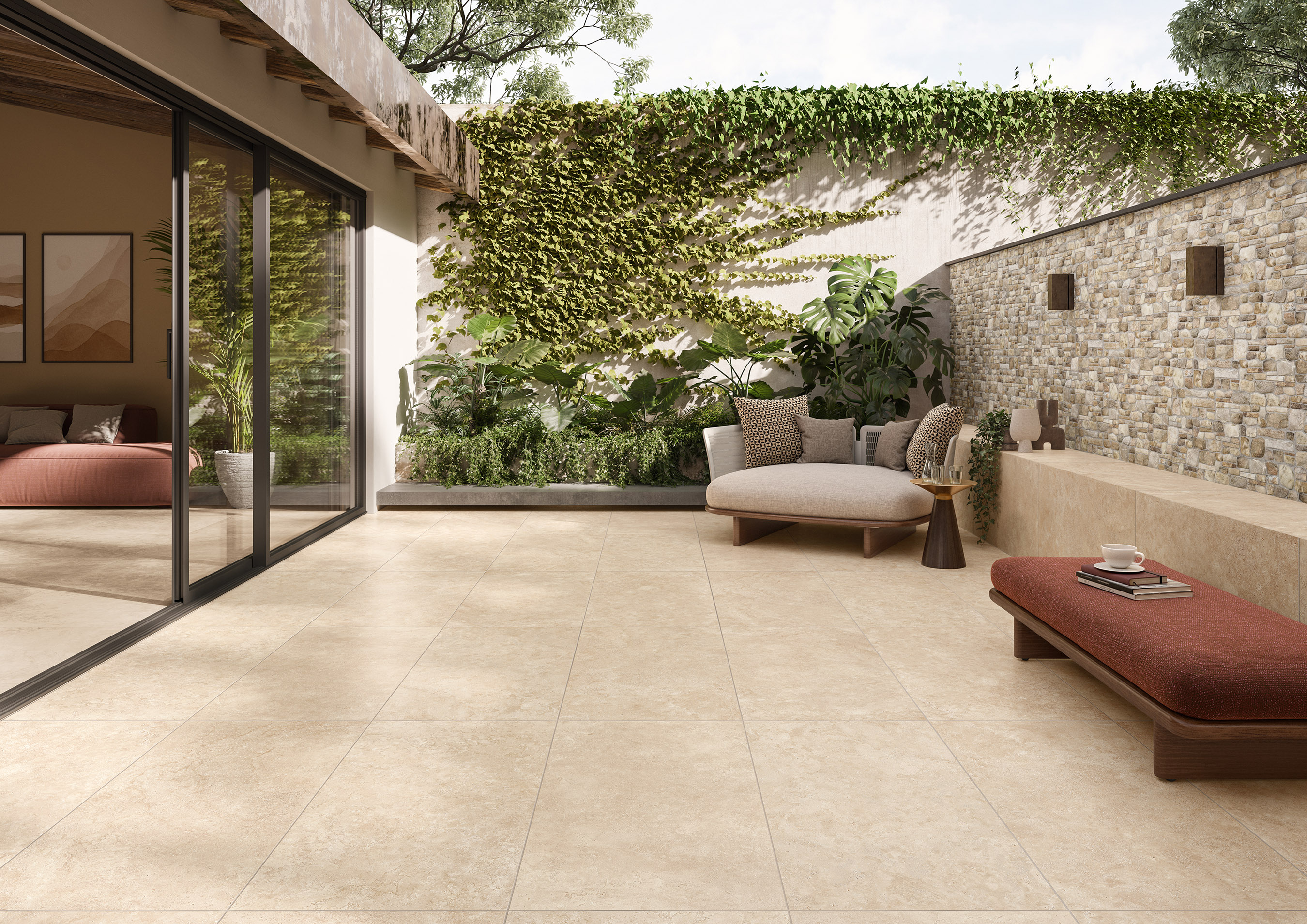 carrelage-exterieur-ceramique-terrasse-effet-pierre-continuite-interieur-exterieur-suisse.jpg